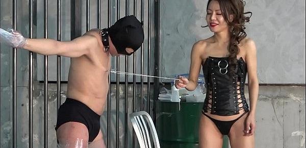  Masked Japanese Slave gets pulled on his nipples and anal dildo by dominatrix